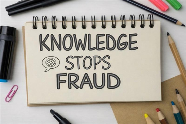 A piece of paper that says knowledge stops fraud