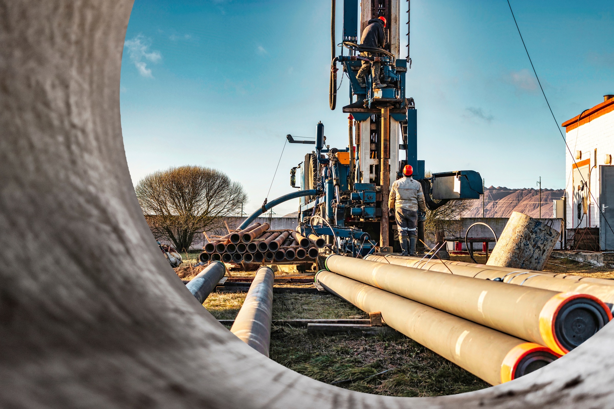 oil drilling rig and pipeline equipment illustrating mineral rights and oil extraction operations in Texas