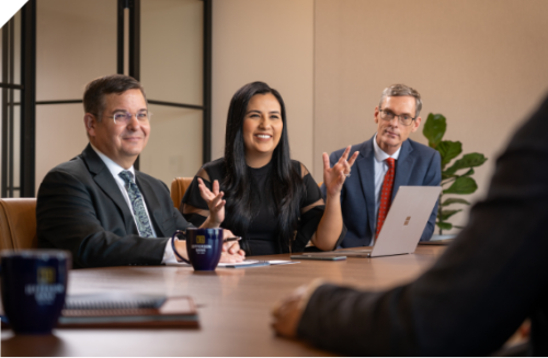 Estate meeting in a conference room setting.