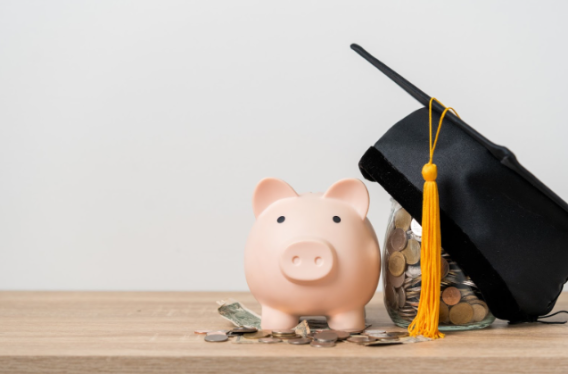 saving money in piggy bank for college