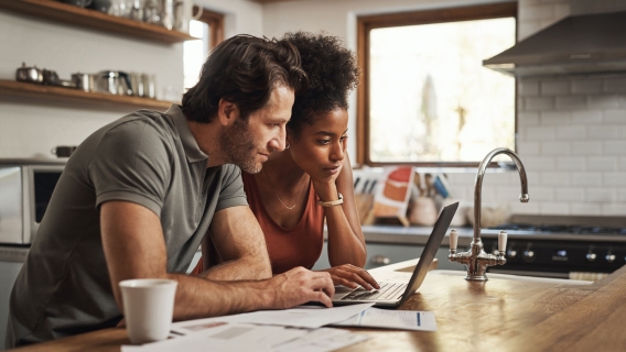A couple planning their personal finance goals together. 