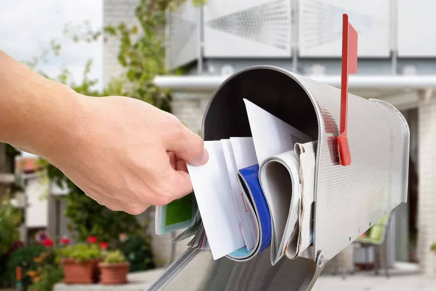 Person checking mailbox.